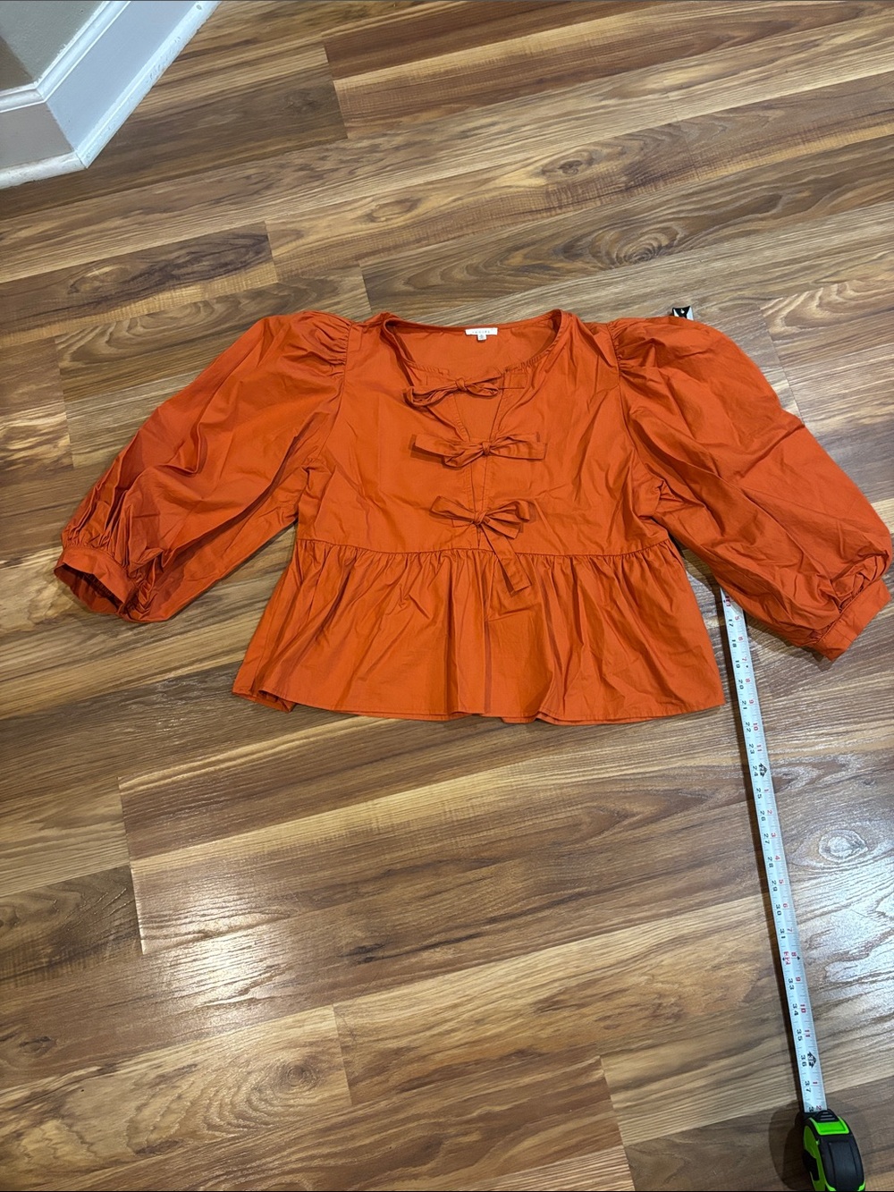 NWOT JODIFL Orange Puff-Sleeve Peplum Blouse with Front Bows